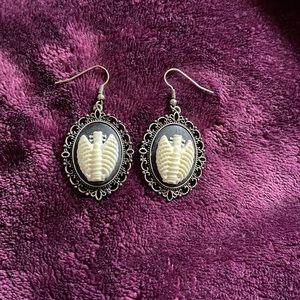 Skeleton torso earrings